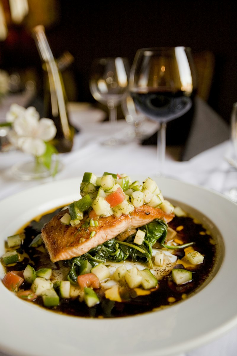 Plated fish dish on a restaurant table