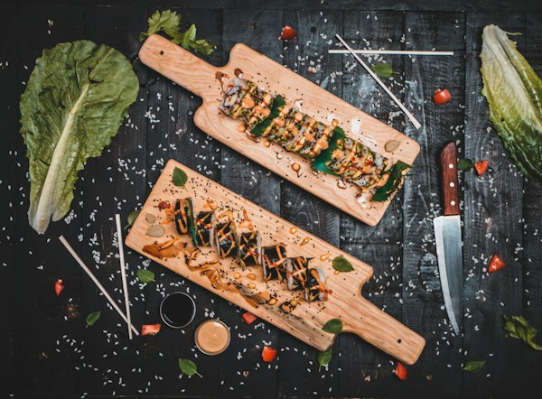 Sushi platters on wooden serving boards
