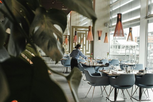 Bright restaurant interior with hanging lamps
